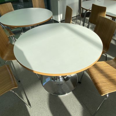 Round Canteen Tables In White With Silver Base